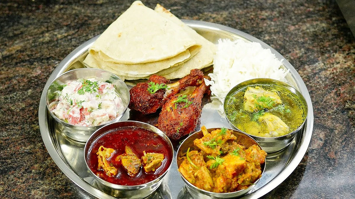 Why was a class 3 student suspended for bringing non-veg food to school?