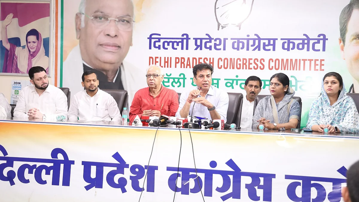 Devender Yadav addresses the media along with Congress councillors