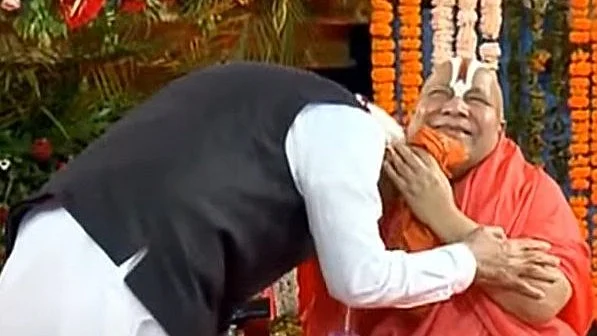 Rambhadracharya (right), here seen embracing prime minister Narendra Modi
