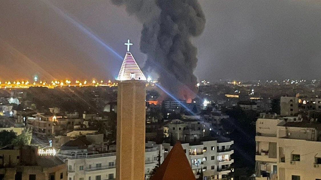 An Israeli strike into Lebanon lands behind a church spire