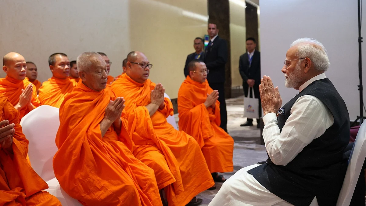 PM Modi with spiritual leaders in Lao-PDR (photo: PTI)