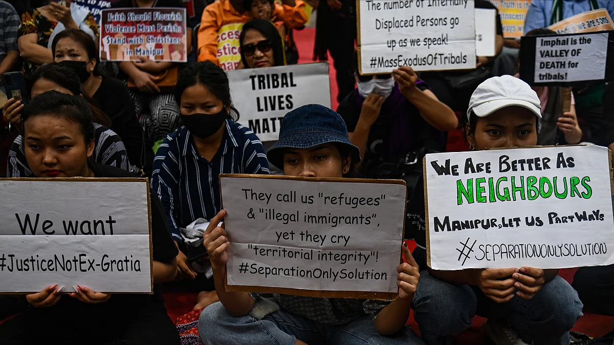 People protesting against the ongoing violence in Manipur, New Delhi