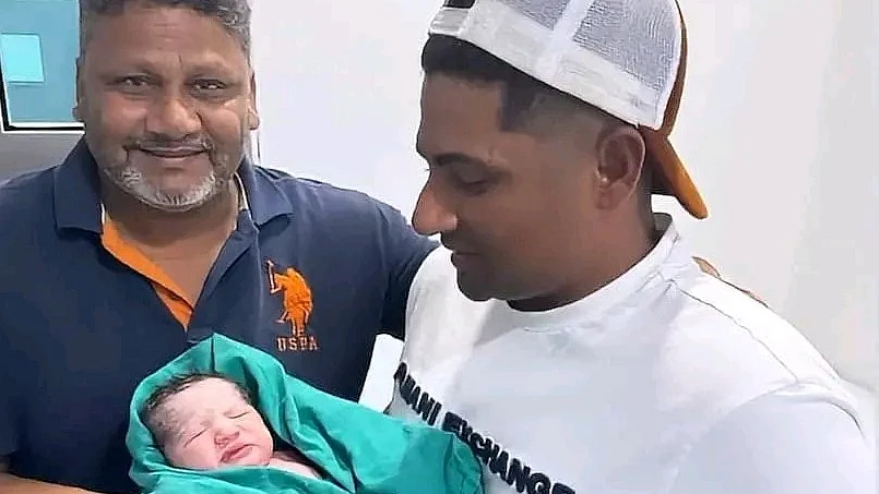 Sarfaraz Khan (right) with his newborn son and father Naushad on 21 October 2024