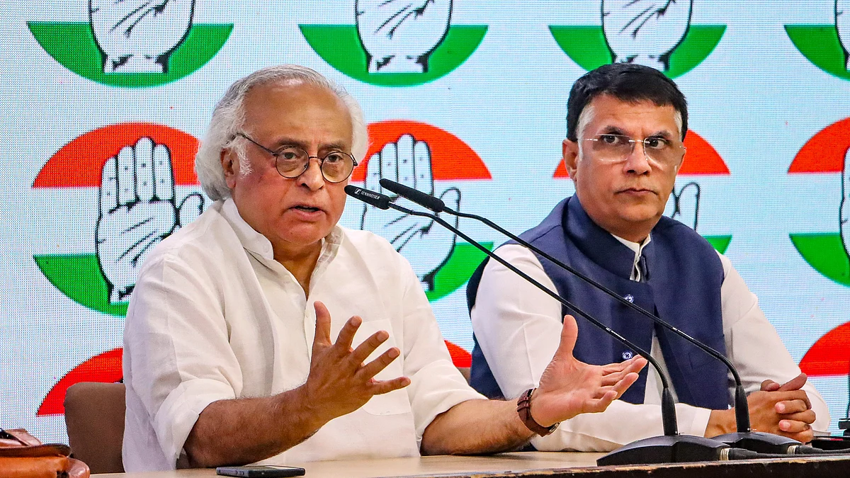 Congress leaders Jairam Ramesh and Pawan Khera address a press conference at AICC headquarters