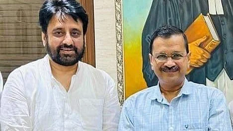 Amanatullah Khan with Arvind Kejriwal