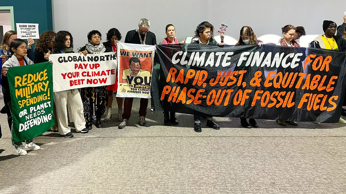 Demonstrators demanding developed nations pay up (photo: @Oxfam/X)