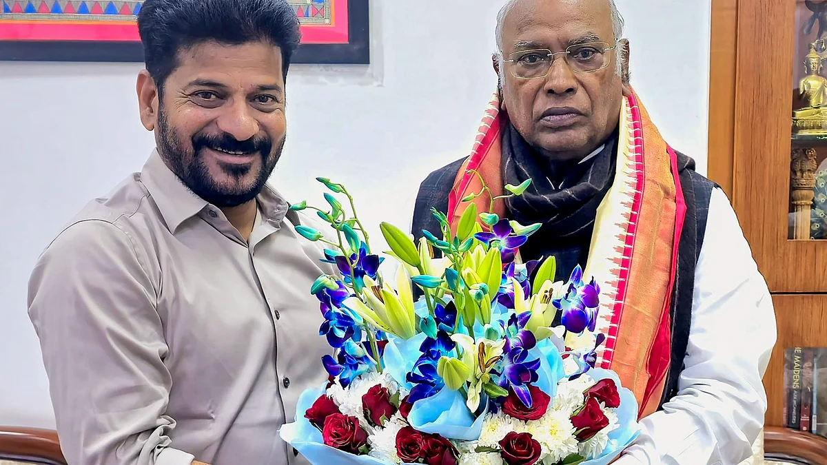 Telangana chief minister A. Revanth Reddy (left) with Congress president Mallikarjun Kharge