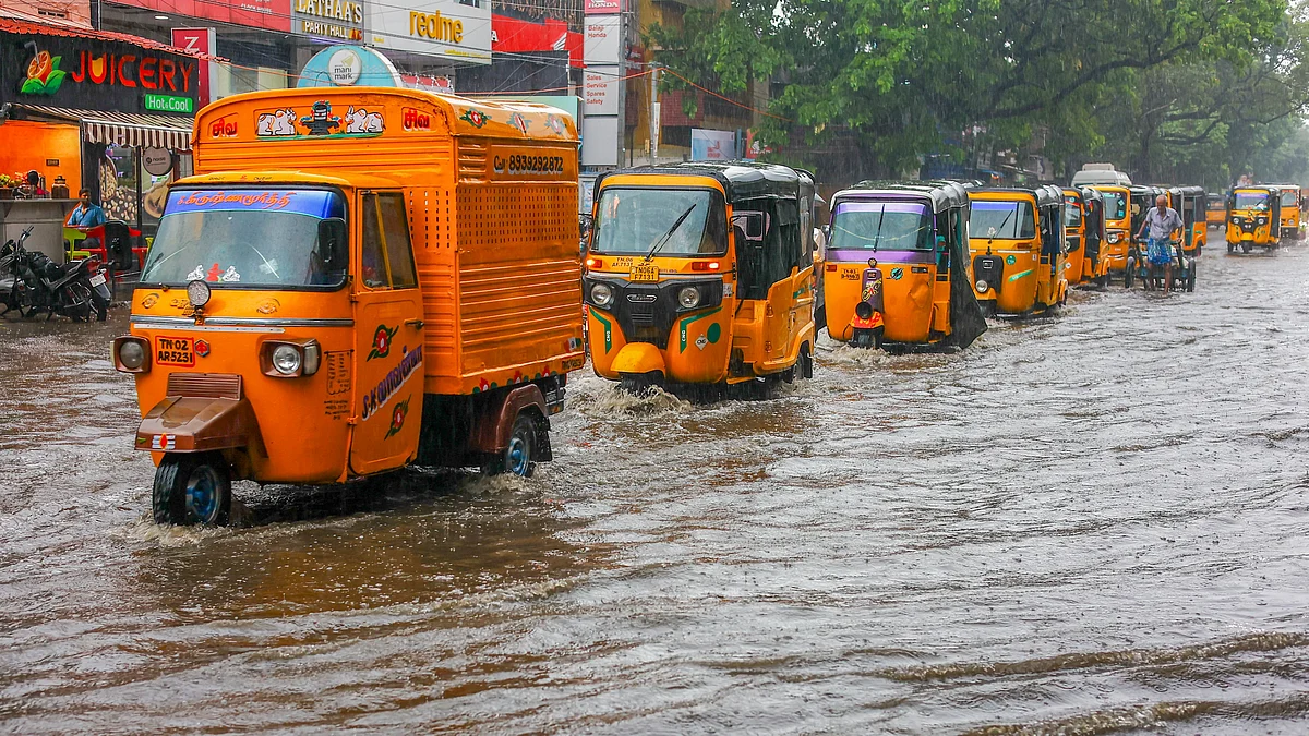 Chennai streets take on sheets of water, slowing down traffic, as a cyclonic storm brews