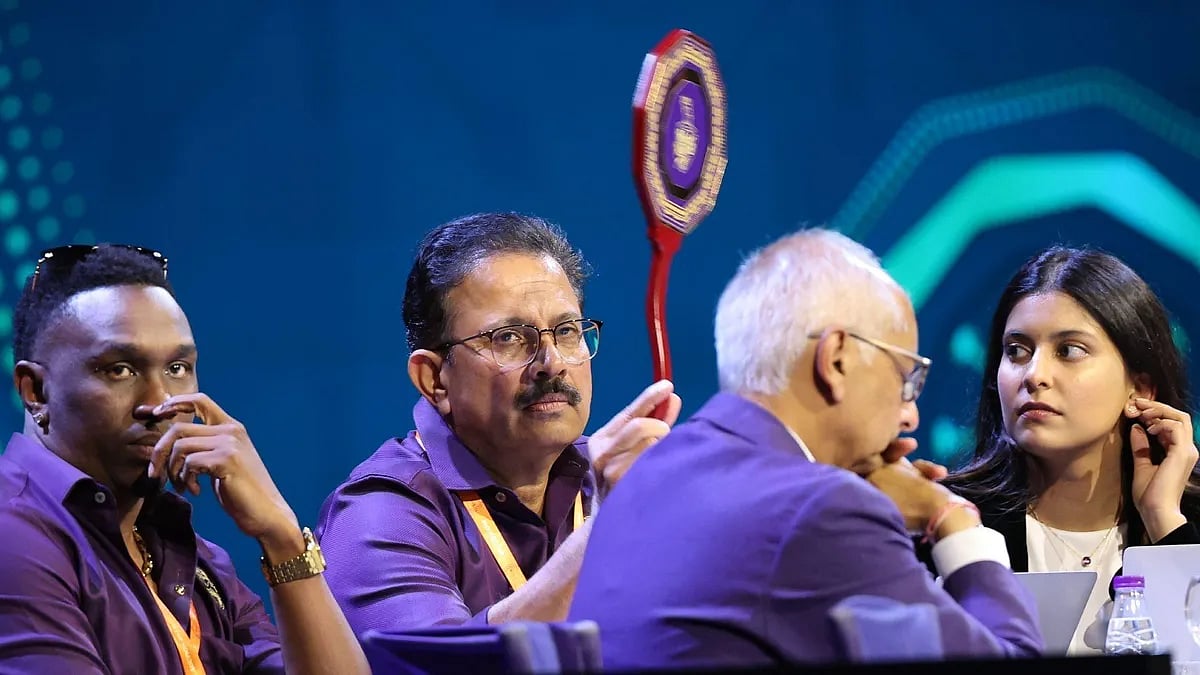Dwayne Bravo (left), KKR CEO Venky Mysore, co-owner Jay Mehta and his daughter at the auction