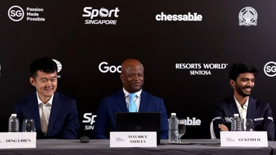 D. Gukesh (right) and Ding Liren (left) at a press con after their 4th game ended in a draw