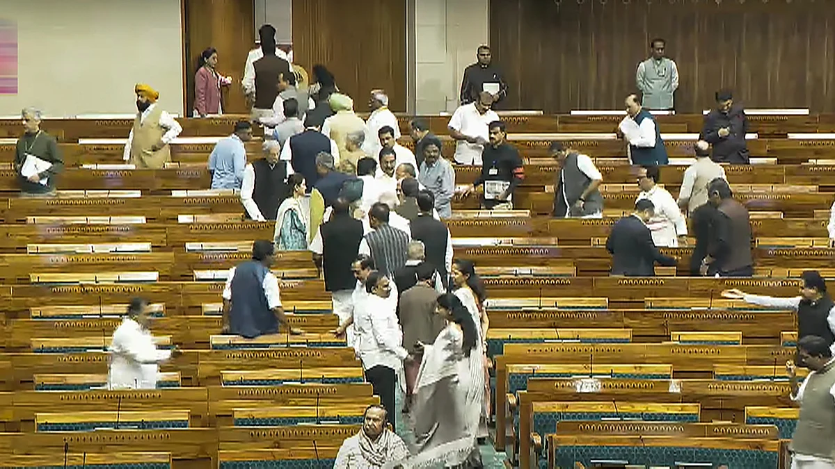 Opposition MPs stage walkout in Lok Sabha on 3 December (photo: PTI)