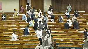 Lok Sabha adjourned till noon as opposition stages protests with posters