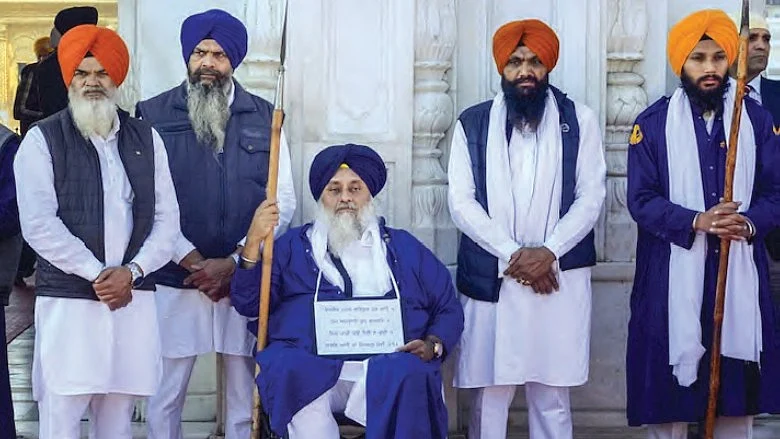 Sukhbir Badal offering sewa at the Golden Temple