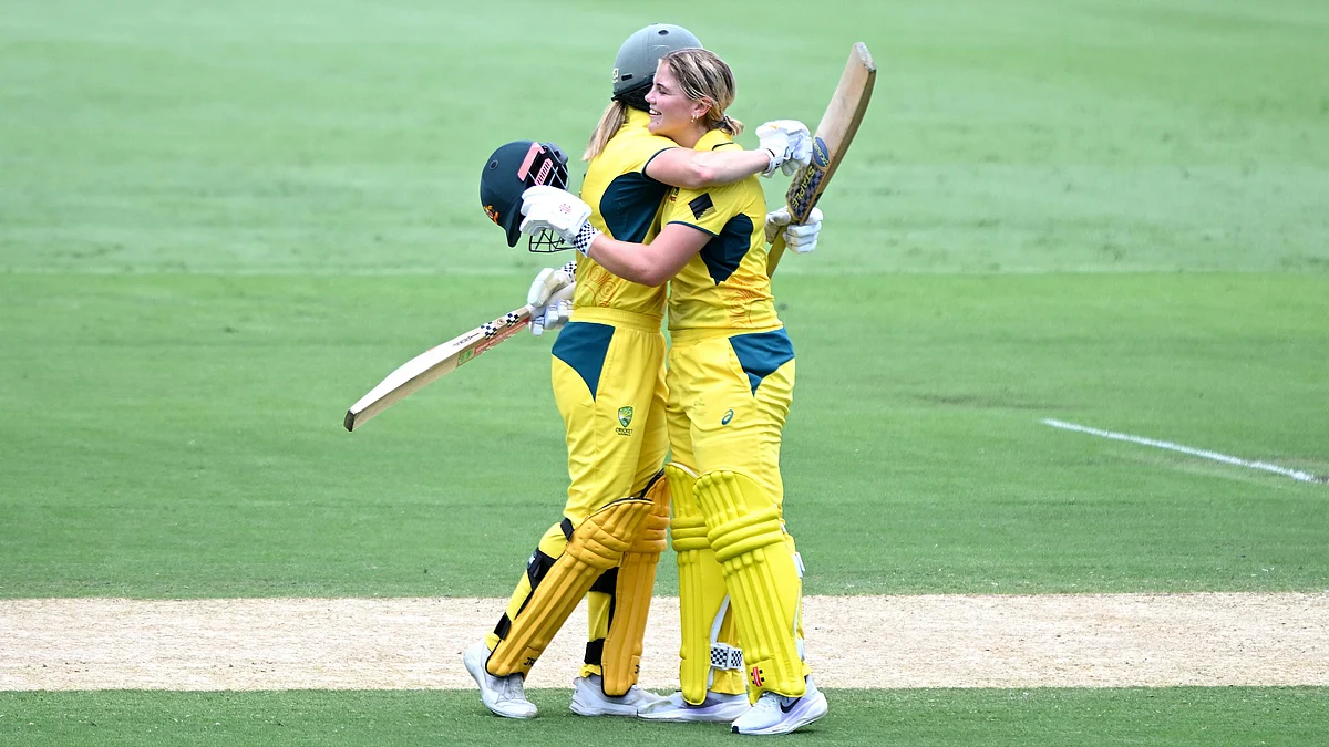 Ellyse Perry and Georgia Voll celebrate Australia's victory over India