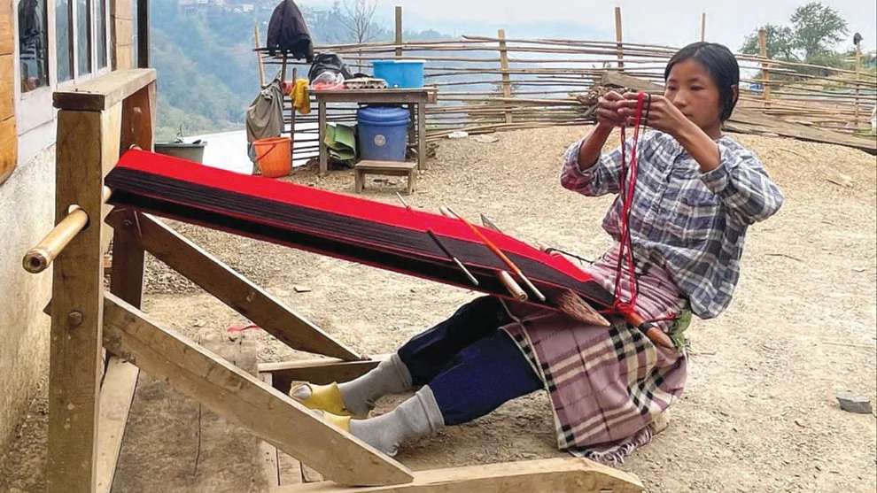 Vehüsülü weaves a pattern on a shawl of the Angami tribe (Photos: Moalemba Jamir)