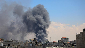 Israel bombards a residential block holding the al-Nuseirat refugee camp in the central Gaza Strip