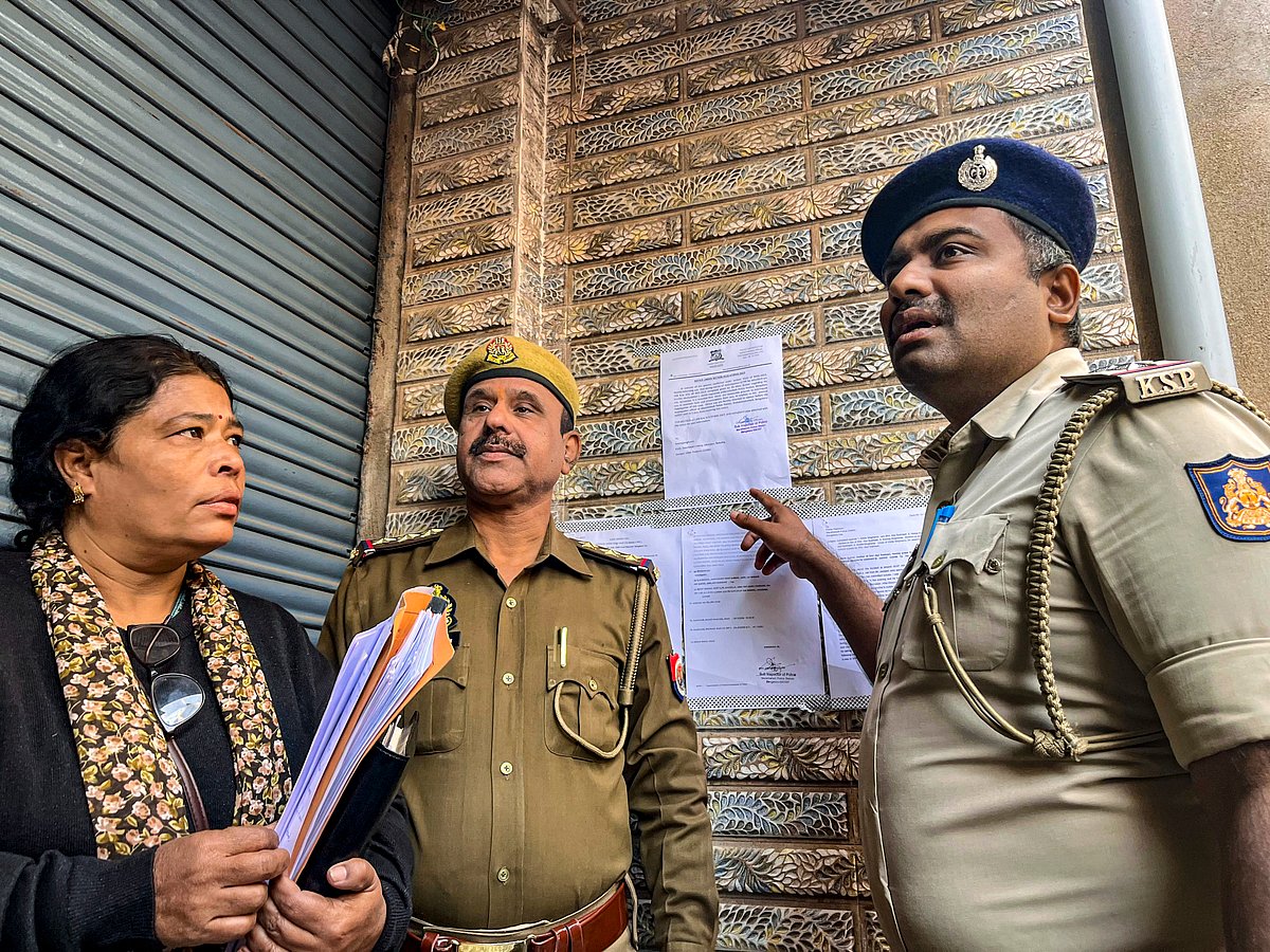 Police put up a notice outside the Singhania residence in Jaunpur (photo: PTI)