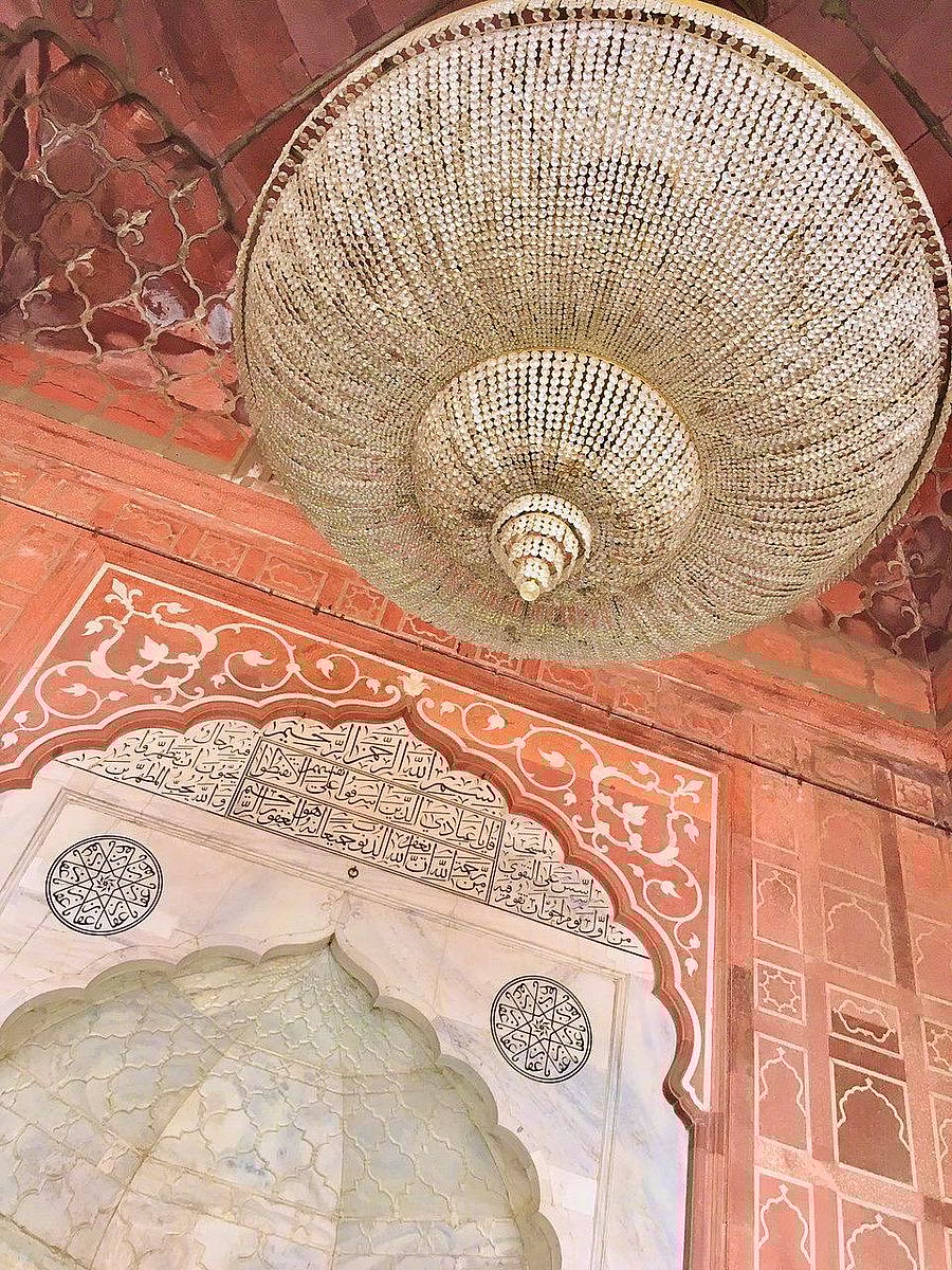 Architectural and artistic detailing within the Delhi Jama Masjid seem to echo shapes and colours from floor to walls