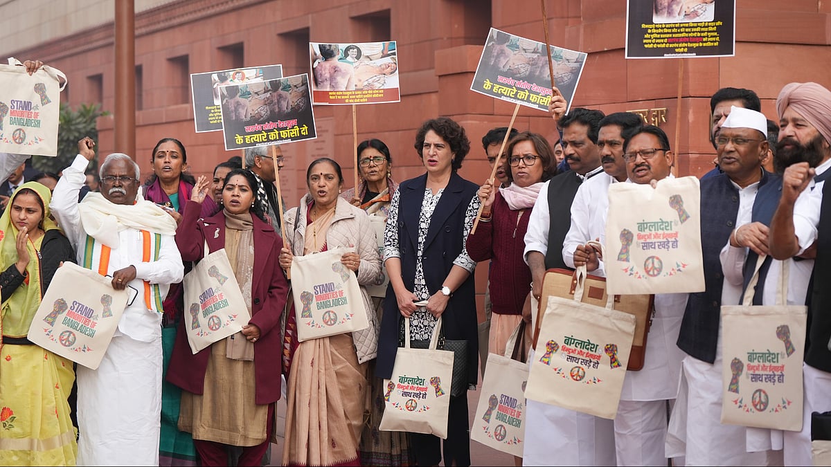 Priyanka Gandhi Vadra with other opposition MPs protest in New Delhi on 17 December (photo: PTI)
