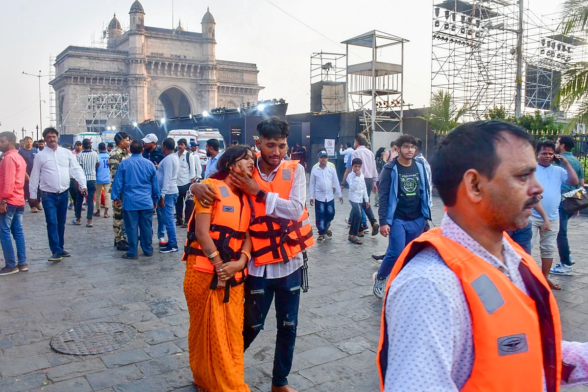 Rescued passengers at the Gateway of India (photo: PTI)