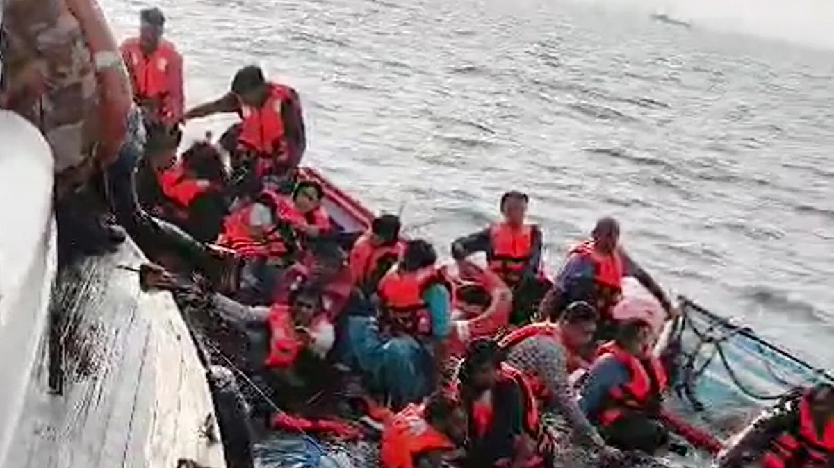 Passengers being rescued from the launch (photo: PTI)
