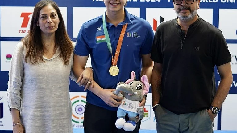 A family affair: Joydeep Karmakar (right) with Radhika and Adriyan