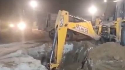 A JCB trying to rescue three-year-old Chetna from a borewell three days after she fell in