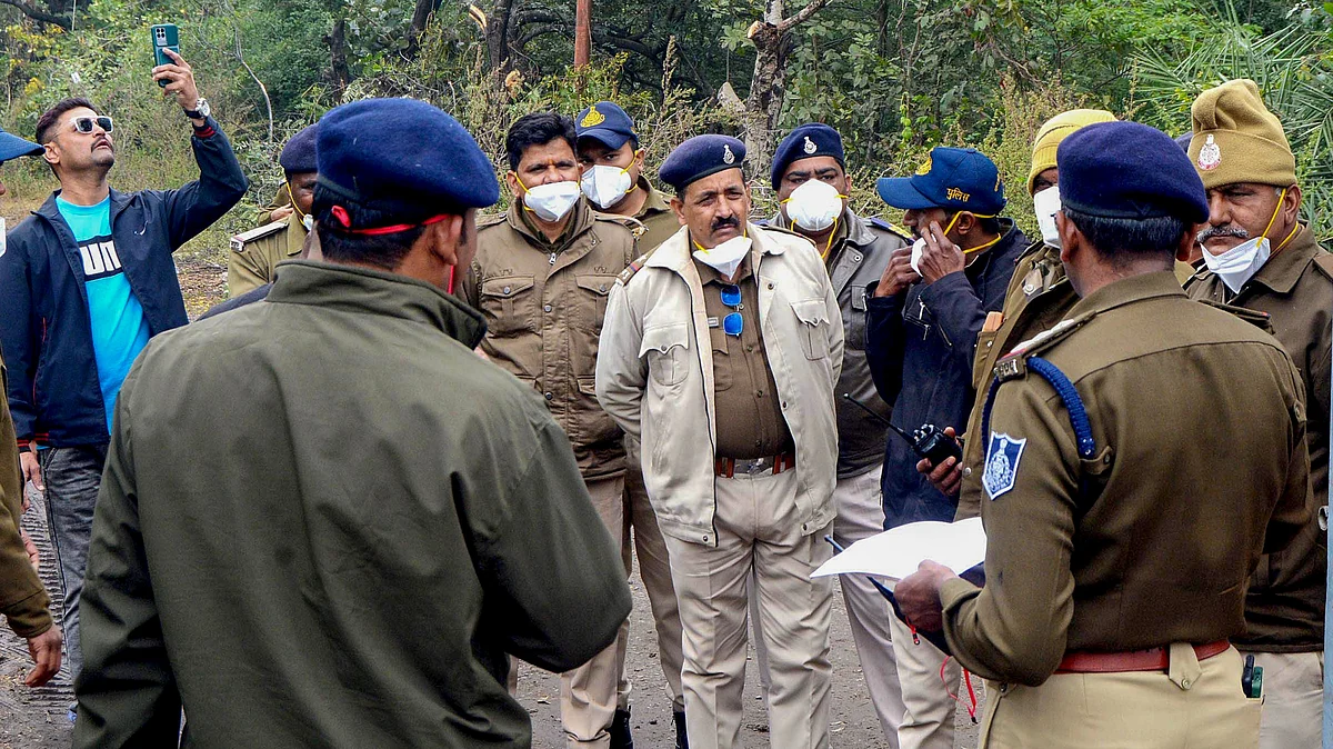 Police oversee collection of toxic waste from the Union Carbide site in Bhopal