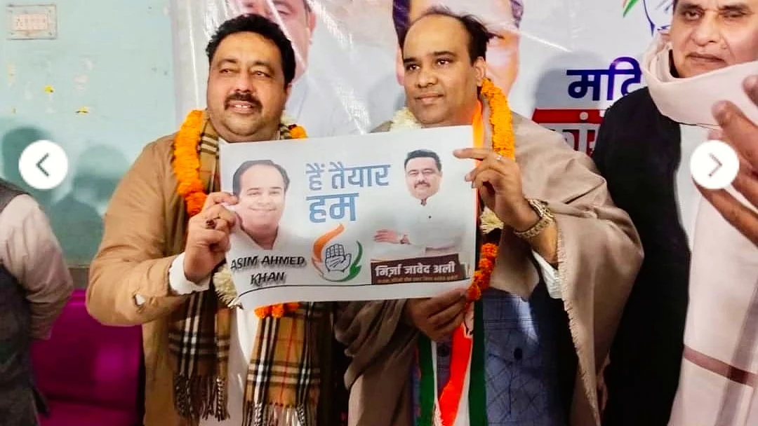 Asim Ahmed Khan (right)