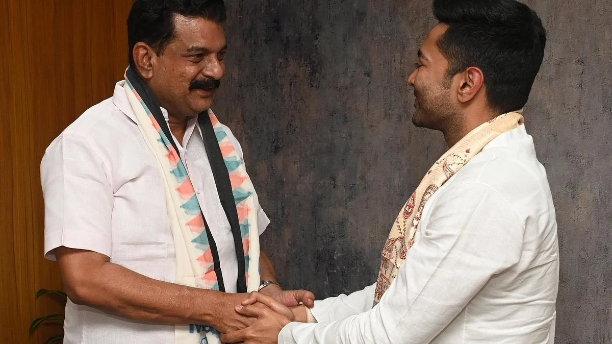 P.V. Anvar (left) welcomed to the Trinamool Congress by Abhishek Banerjee