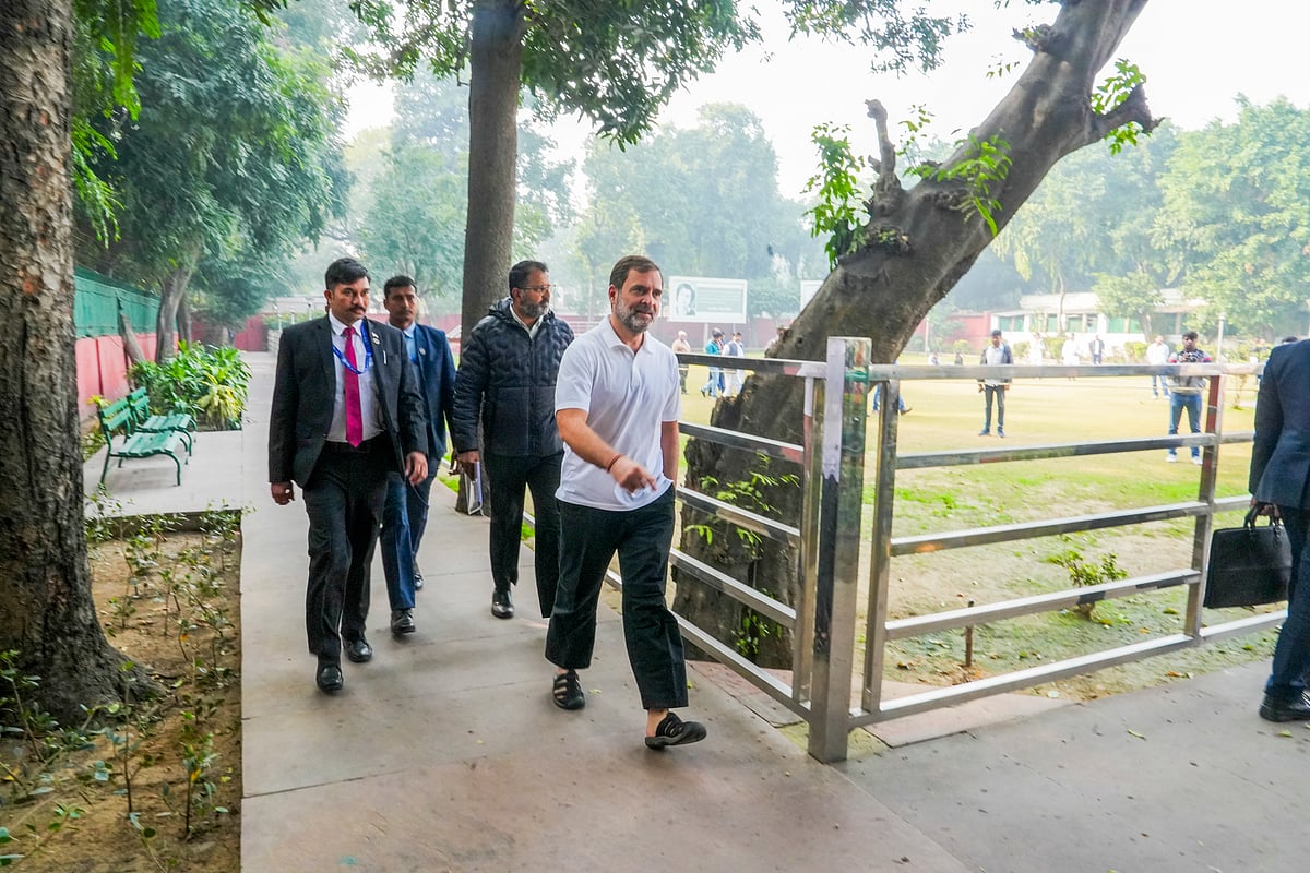 Rahul Gandhi at the gate of 24, Akbar Road (photo: PTI)