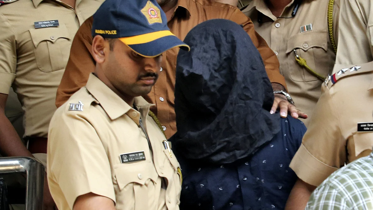 The accused in police custody in Mumbai on 19 January (photo: PTI)