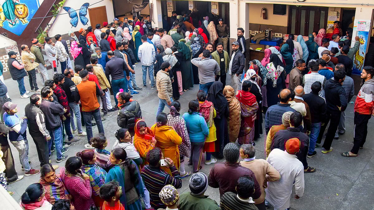 People wait to vote in Uttarakhand local body polls, in Nanital (photo: PTI)