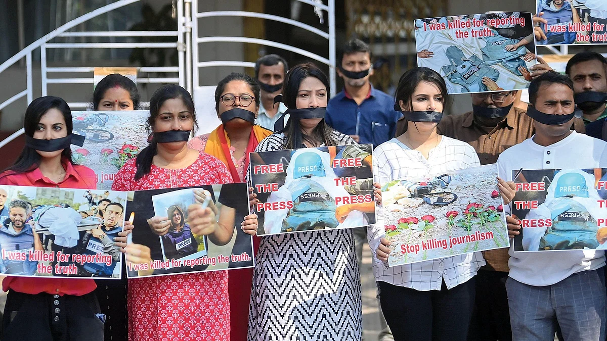 Journalists stage a silent
protest against the stifling of press freedom, Agartala Press Club