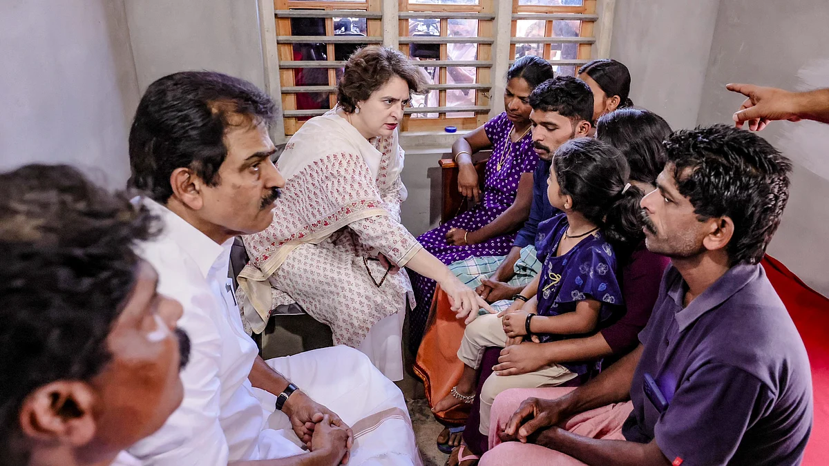 Priyanka Gandhi Vadra consoles a young family member of a woman killed by a tiger in Wayanad