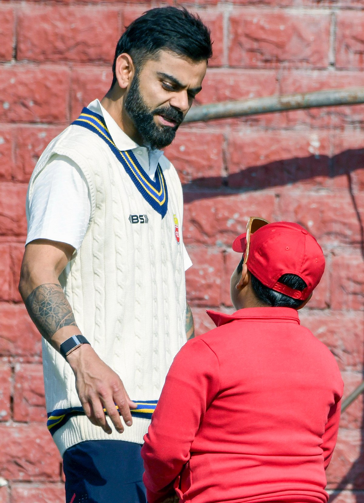 8-year-old Kabir Khan shares a special moment with Indian cricketer Virat Kohli