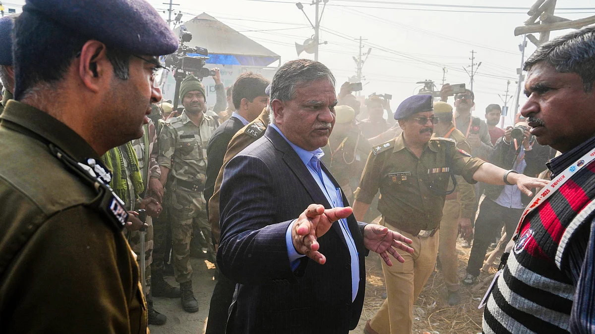 UP chief secretary Manoj Kumar Singh inspects the site of the stampede (photo: PTI)