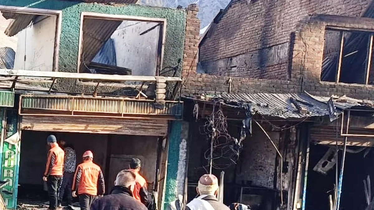 The Kashmir SDRF investigate the fire-ruined Sonamarh market area on the morning after