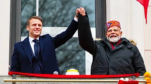 Macron-Modi resume official duties after handshake 'snub'