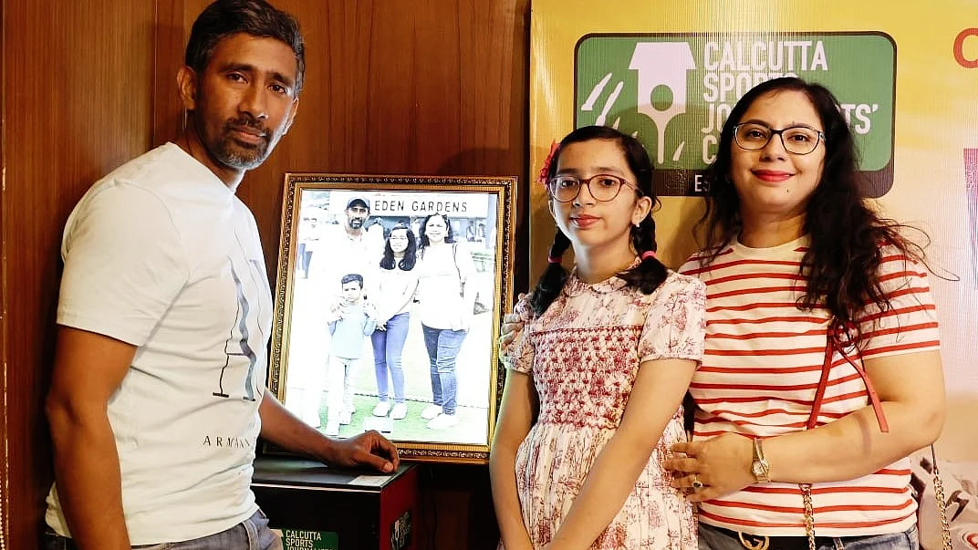 Wriddhiman Saha with his family at a felicitation on Thursday