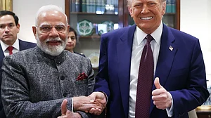 Modi and Trump meet in Washington, with an awkward handshake and a thumbs-up apiece