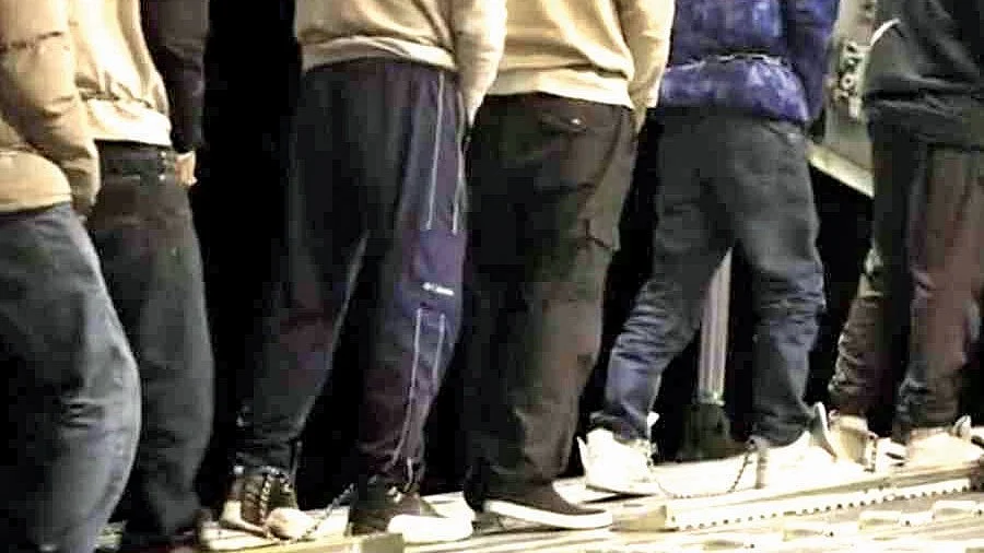 Screengrab of a video that showed chained Indians being herded into a US military plane (@USBPChief/X)