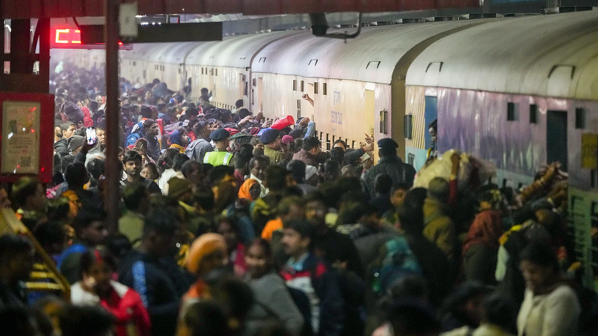 An overcrowded platform at New Delhi railway station as people try to board trains for Maha Kumbh