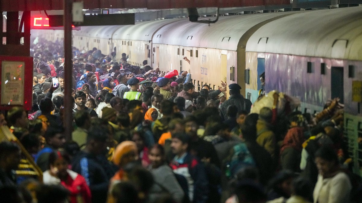 People try to board trains for Maha Kumbh at New Delhi railway station (file photo)