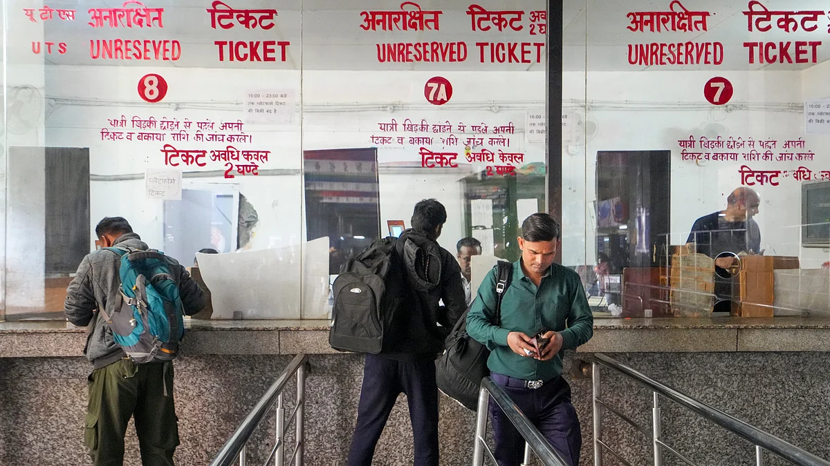 Passengers at ticket counters at New Delhi railway station on 17 February (photo: PTI)