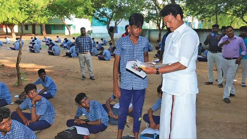 Tamil Nadu education minister Anbil Mahesh Poyyamozhi interacts with school students