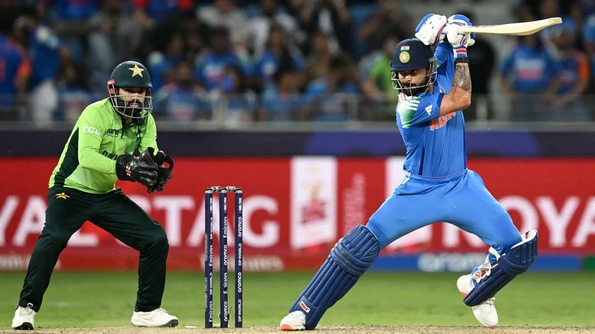 Virat Kohli on song during his match-winning century in Dubai, 23 Feb. 2025