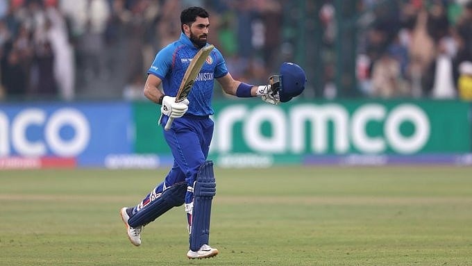 Player of the Match Ibrahim Zadran on reaching his century (photo: @sachin_rt/X)