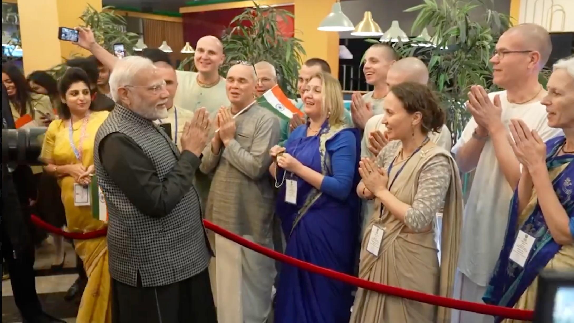 Prime minister Narendra Modi greeted with bhajans by ISKCON adherents in Kazan