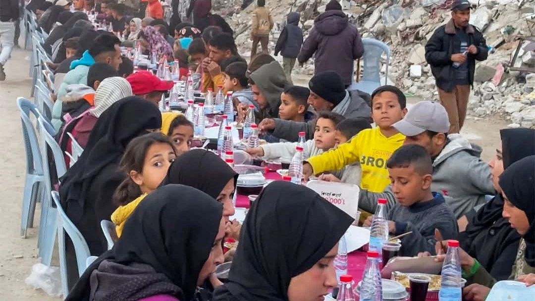 Will these iftar tables be empty in 10 days, wonder the children of Gaza amidst an Israeli block on aid